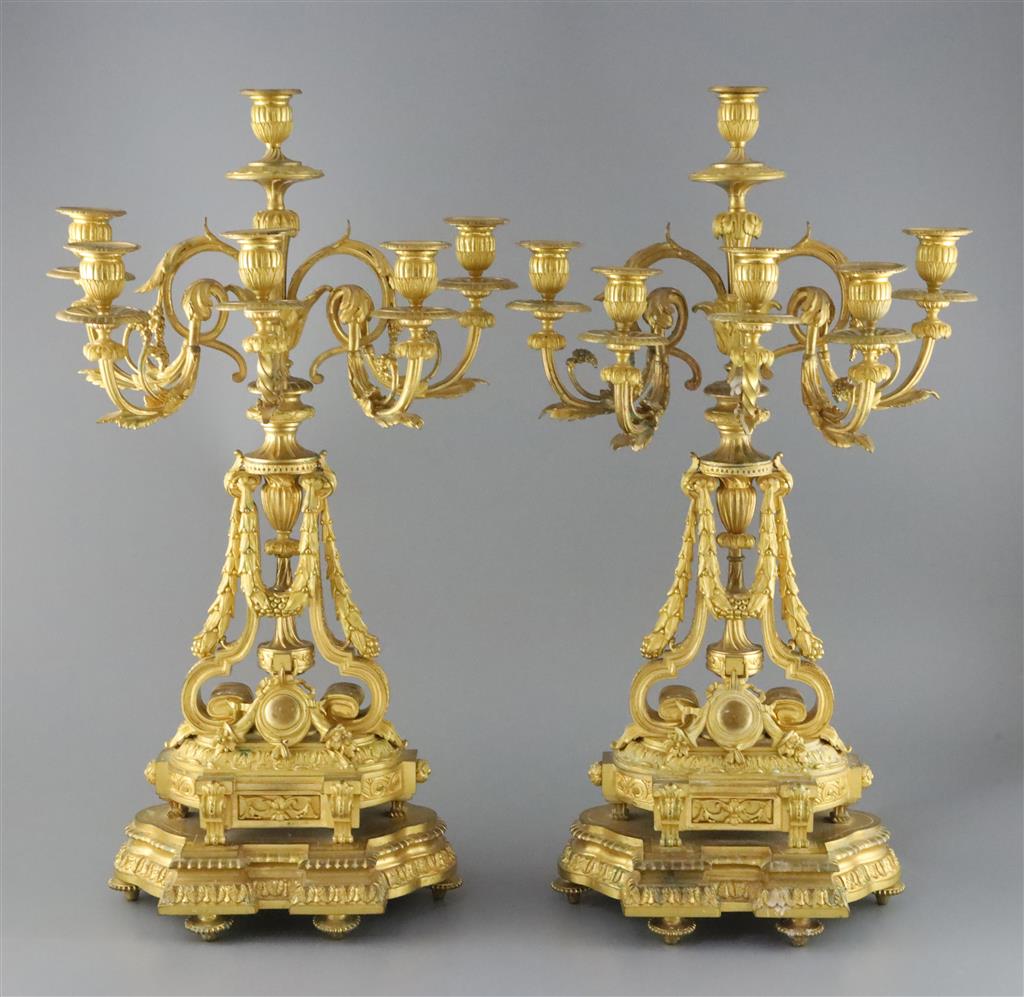 A pair of late 19th century French ormolu six light candelabra, width 13in. height 23.25in.